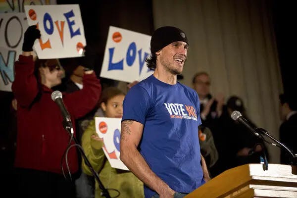 Chris Kluwe speaking to group of people in Minnesota