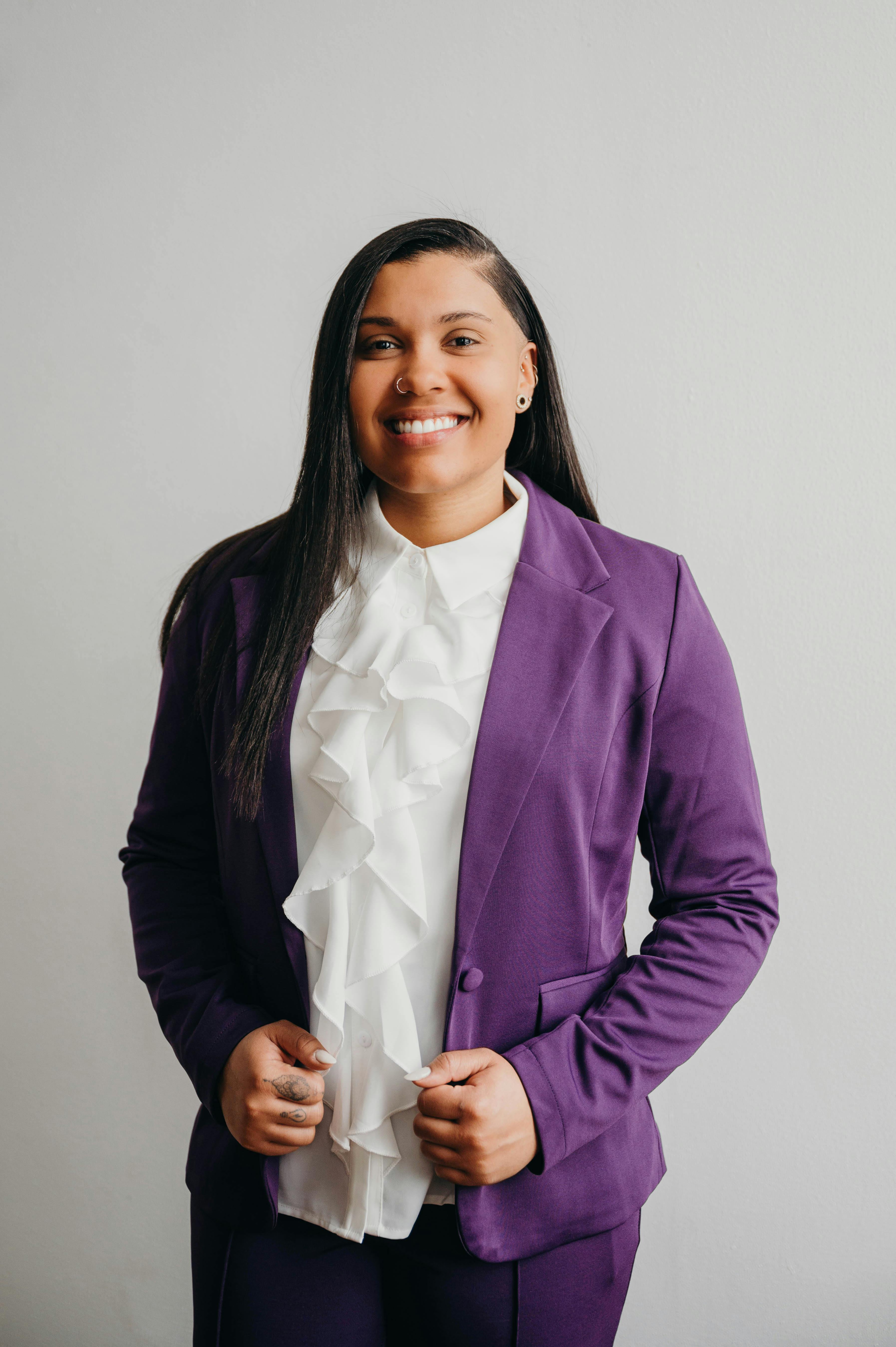 Portrait of Gabby Hood standing and smiling