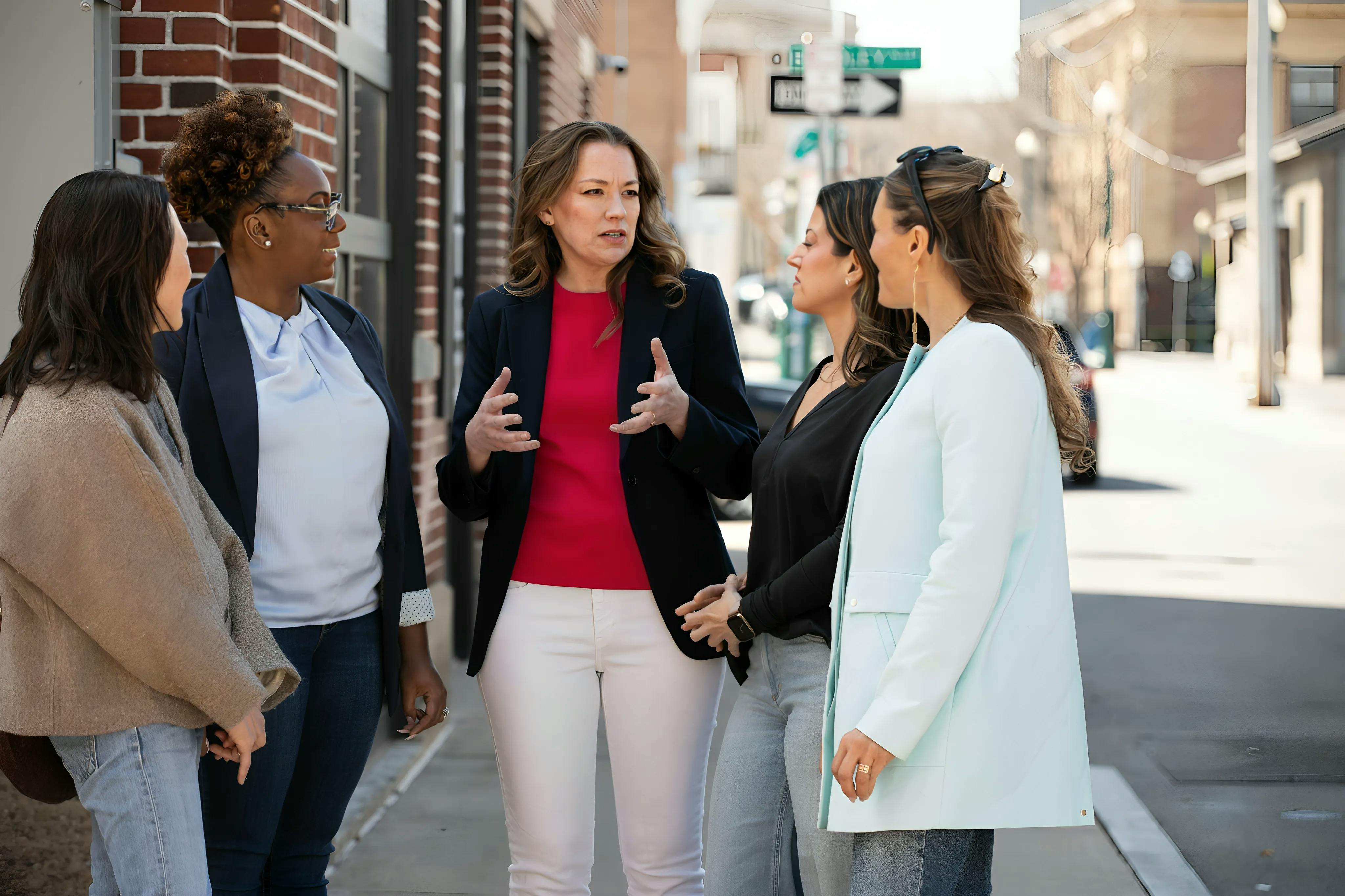 Sarah Rogerson talking with neighbors